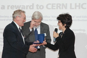 L. Cifarelli awarding S. Myers (left) and R. Heuer (middle)