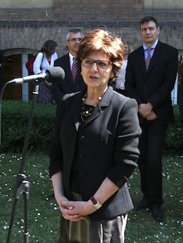 Luisa Cifarelli in front of the building