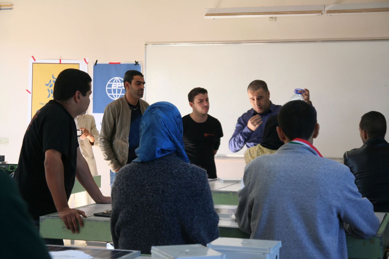 EPS IT manager & MCDA president Ahmed Ouarab presenting the solar kits to students